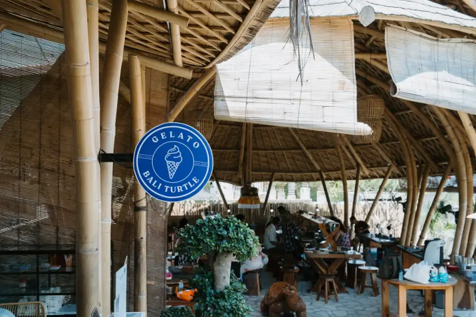 The round Gelato Bali Turtle sign in the bamboo studio